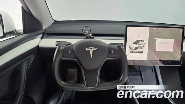 Tesla Model Y — Фото автомобиля 13