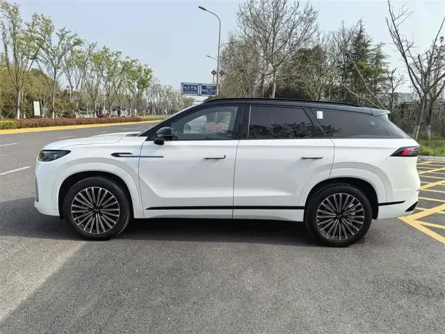 Chery Tiggo 9 — Фото автомобиля 9