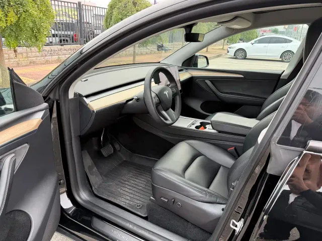 Tesla Model Y — Фото автомобиля 7