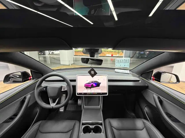 Tesla Model Y — Фото автомобиля 13