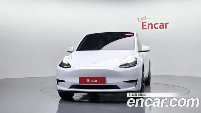 Tesla Model Y — Фото автомобиля 2