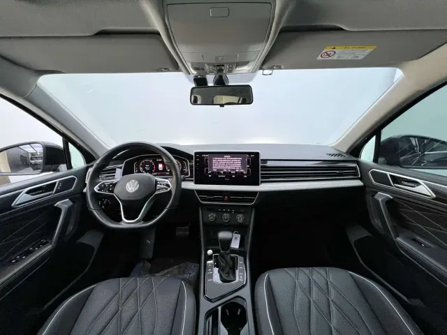 Volkswagen Tiguan L — Фото автомобиля 11