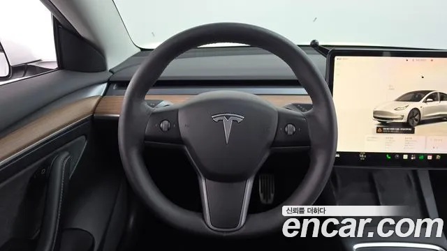 Tesla Model 3 — Фото автомобиля 11