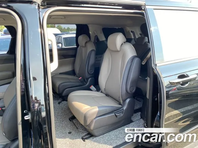 Kia Carnival Generation 4 — Фото автомобиля 14