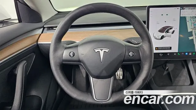 Tesla Model 3 — Фото автомобиля 12