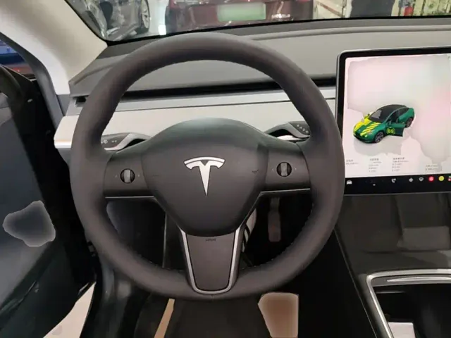 Tesla Model Y — Фото автомобиля 10