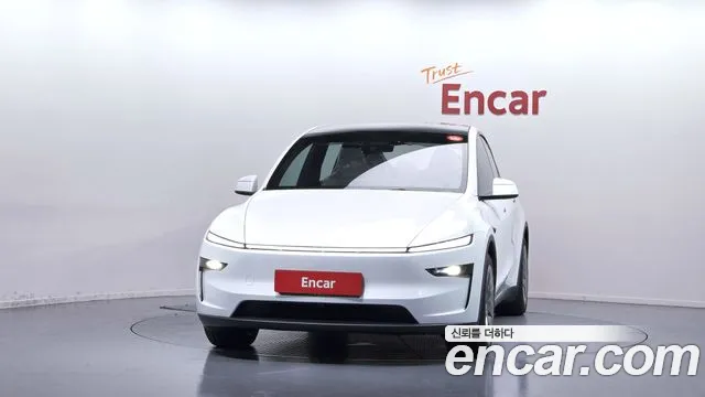 Tesla Model Y — Фото автомобиля 3