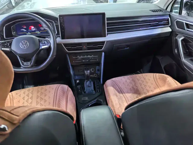 Volkswagen Tiguan L — Фото автомобиля 12