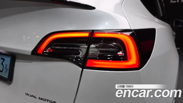 Tesla Model Y — Фото автомобиля 8