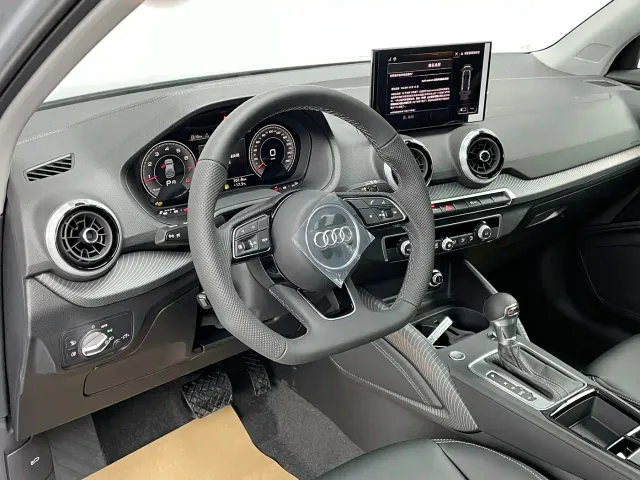 Audi Q2L — Фото автомобиля 10