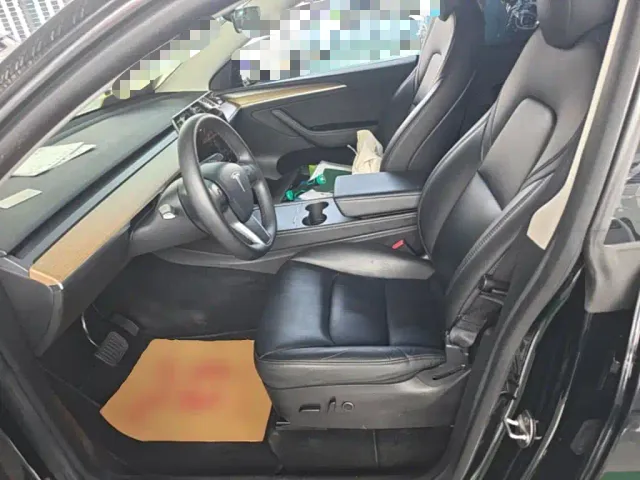 Tesla Model Y — Фото автомобиля 14