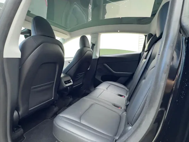Tesla Model Y — Фото автомобиля 16