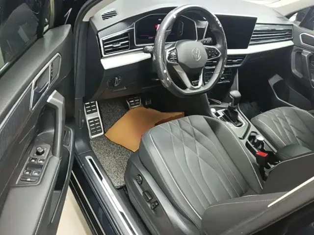Volkswagen Tiguan L — Фото автомобиля 15