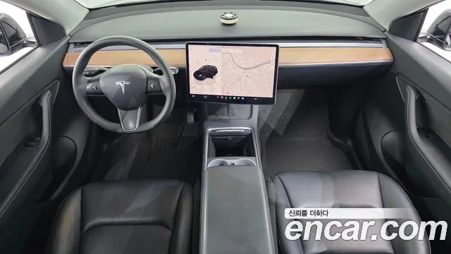 Tesla Model Y — Фото автомобиля 7