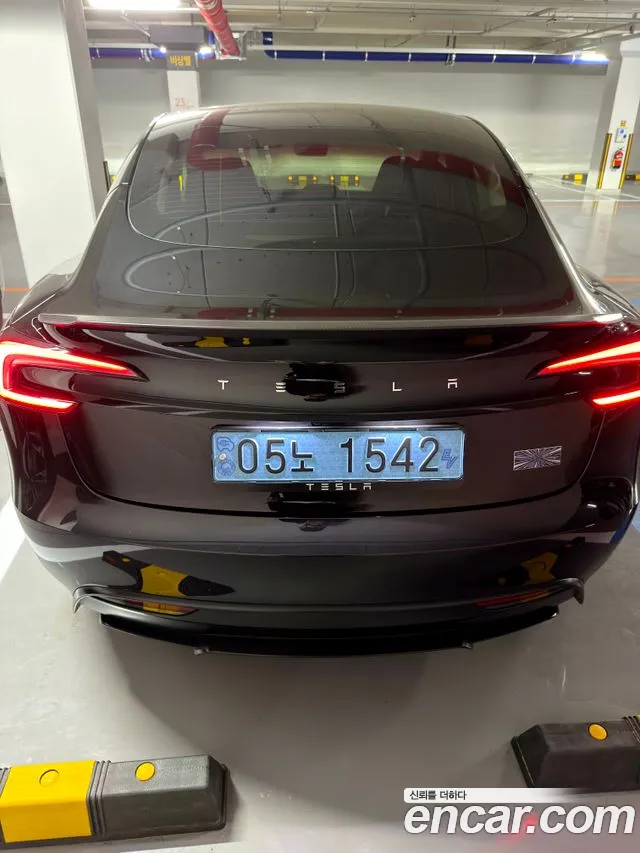 Tesla Model 3 — Фото автомобиля 4