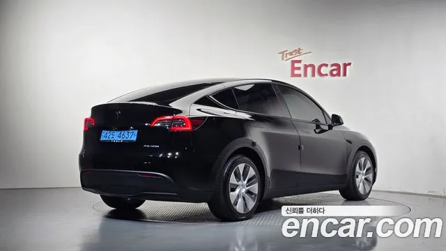 Tesla Model Y — Фото автомобиля 2