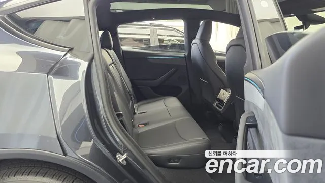 Tesla Model Y — Фото автомобиля 17