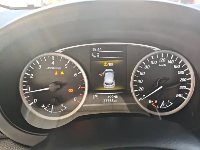 Nissan Tiida — Фото автомобиля 11