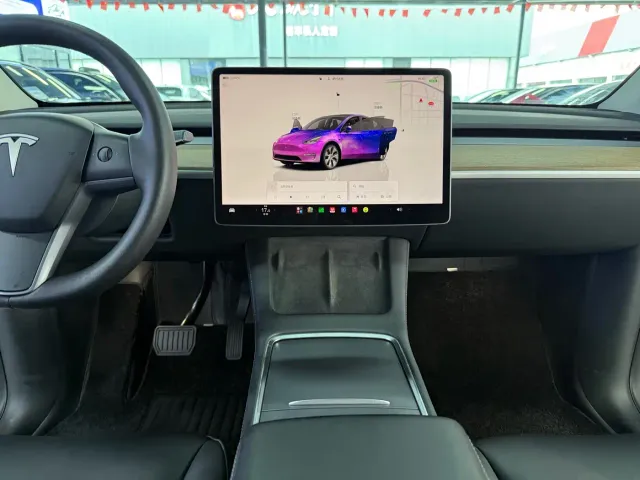 Tesla Model Y — Фото автомобиля 8