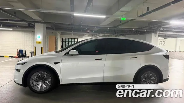Tesla Model Y — Фото автомобиля 5
