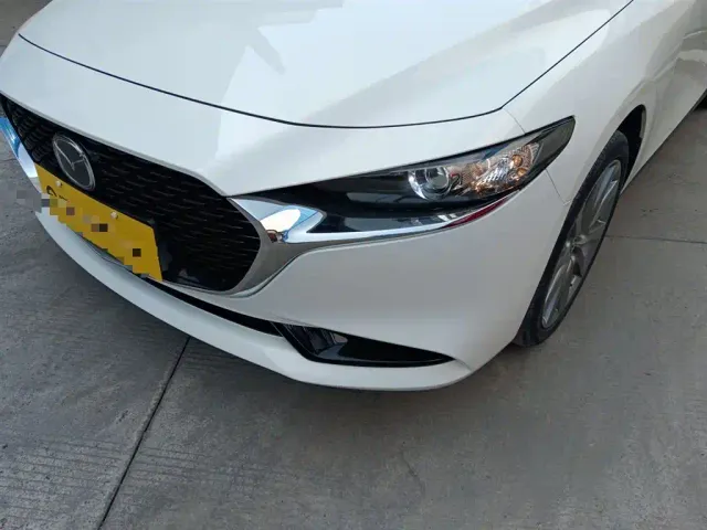 Mazda Axela — Фото автомобиля 17