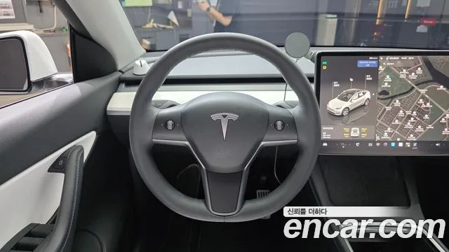 Tesla Model Y — Фото автомобиля 12