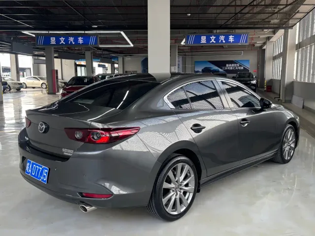 Mazda Axela — Фото автомобиля 16