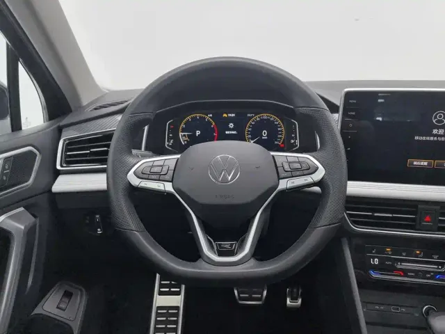 Volkswagen Tiguan L — Фото автомобиля 11