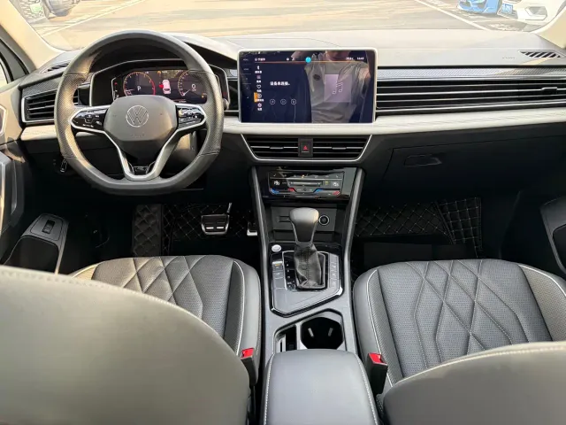 Volkswagen Tiguan L — Фото автомобиля 9