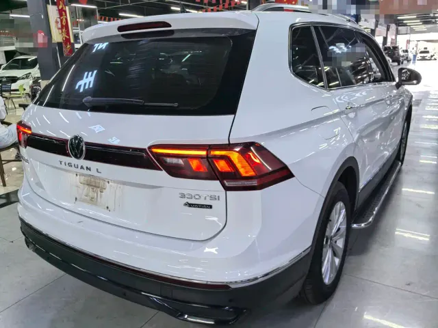 Volkswagen Tiguan L — Фото автомобиля 6