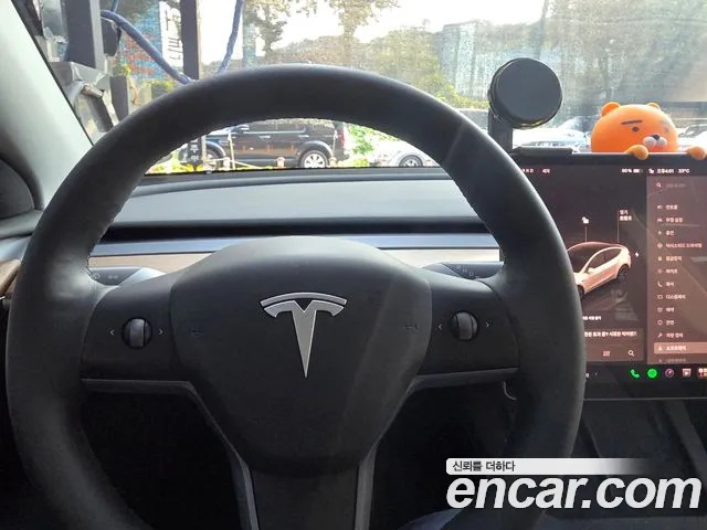 Tesla Model Y — Фото автомобиля 7