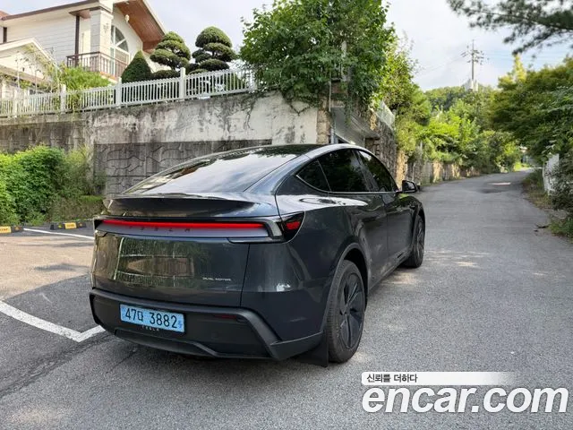 Tesla Model Y — Фото автомобиля 5