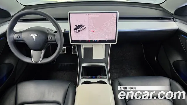 Tesla Model 3 — Фото автомобиля 10