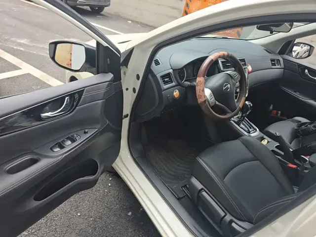 Nissan Tiida — Фото автомобиля 15