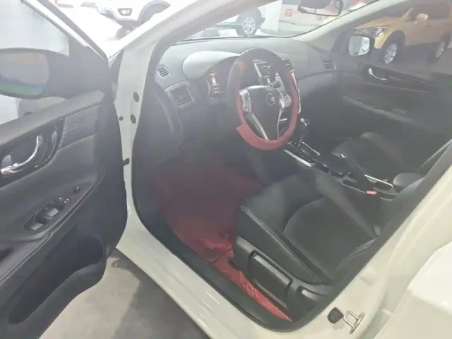 Nissan Tiida — Фото автомобиля 15