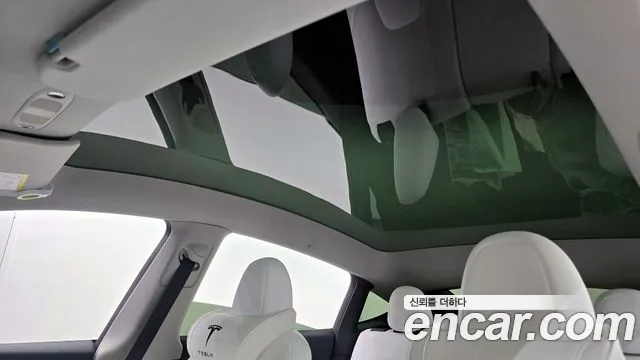 Tesla Model Y — Фото автомобиля 19