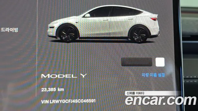 Tesla Model Y — Фото автомобиля 11