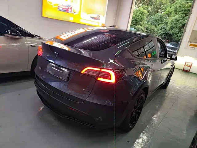 Tesla Model Y — Фото автомобиля 6
