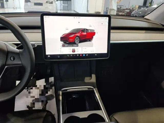 Tesla Model Y — Фото автомобиля 12