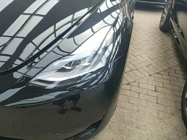 Tesla Model Y — Фото автомобиля 23