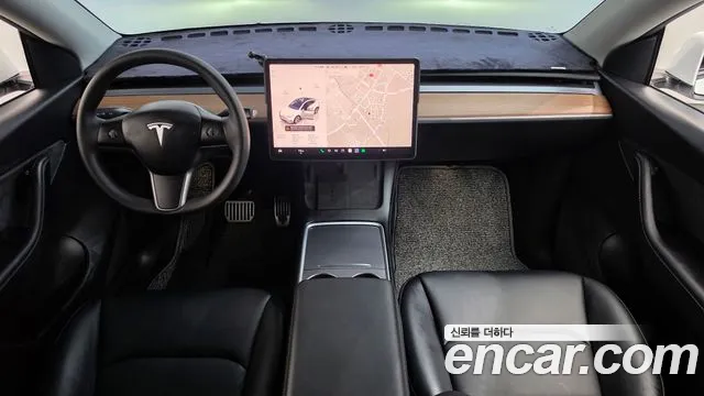 Tesla Model Y — Фото автомобиля 10