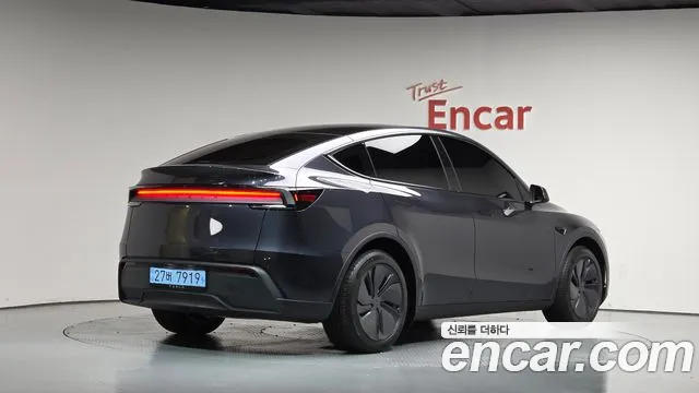 Tesla Model Y — Фото автомобиля 2