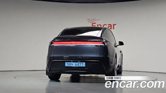 Tesla Model Y — Фото автомобиля 4