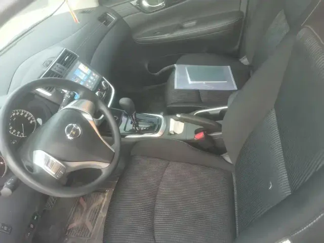 Nissan Tiida — Фото автомобиля 10