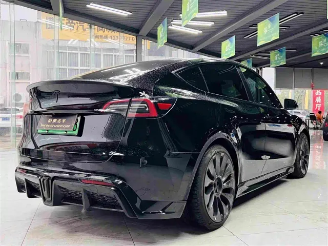 Tesla Model Y — Фото автомобиля 8