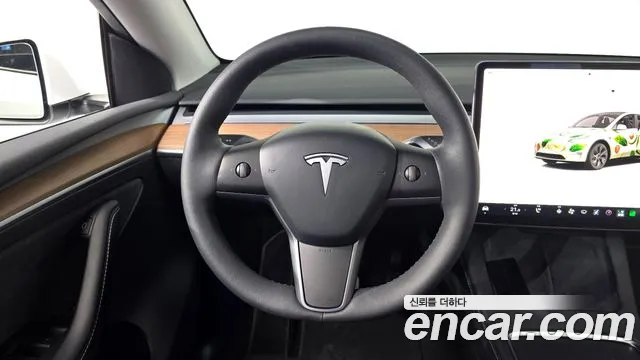 Tesla Model Y — Фото автомобиля 18
