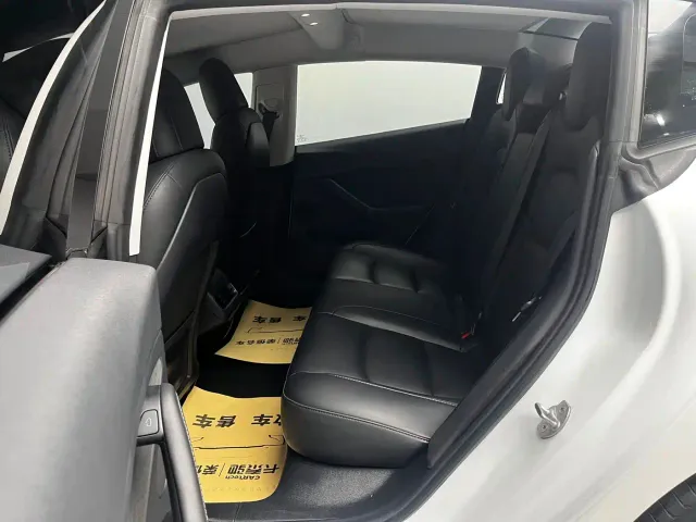 Tesla Model 3 — Фото автомобиля 11