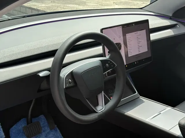 Tesla Model Y — Фото автомобиля 11