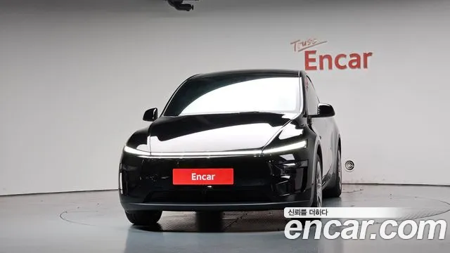 Tesla Model Y — Фото автомобиля 3