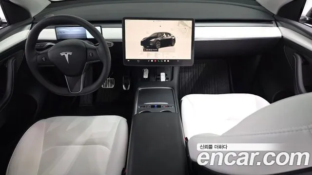 Tesla Model Y — Фото автомобиля 9
